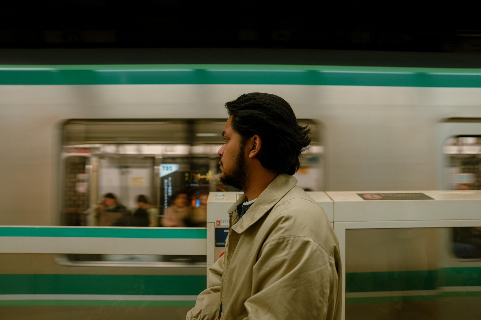 Kevin at a train station in Tokyo
